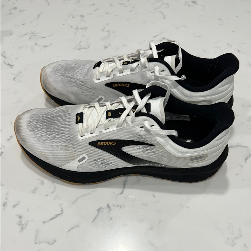 Brooks Women’s size 11 1/2 to 12 or Men's 10 1/2  White and Black Running Shoes